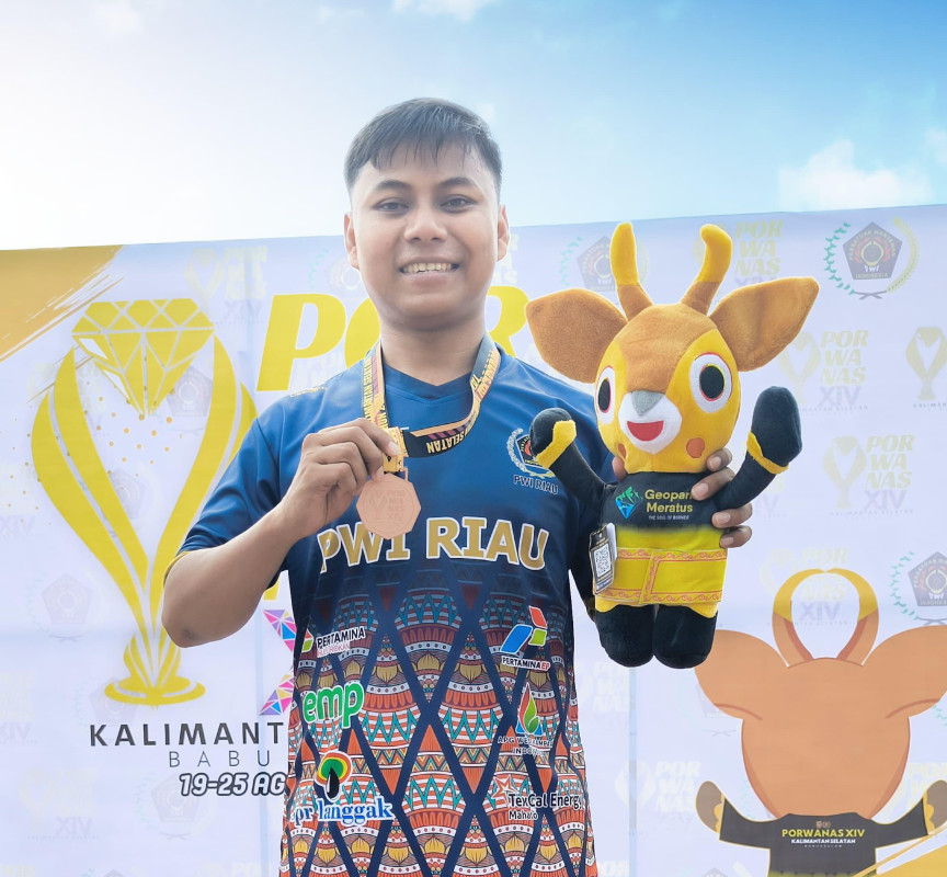 Rahmat Hidayat Persembahkan Medali Pertama untuk Kontingen Porwanas  Riau