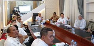 Kadiskes Riau dan Pj Bupati Kampar Bahas Percepatan Jaminan Kesehatan