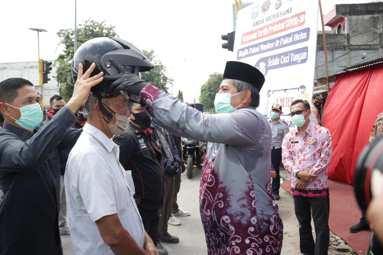 Bupati Siak dan Kapolres Canangkan Kawasan Wajib Helm dan Masker