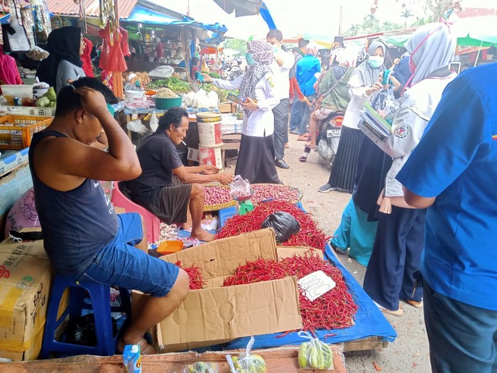 Turun ke Pasar, Diskes Riau Imbau Masyarakat Gunakan Masker
