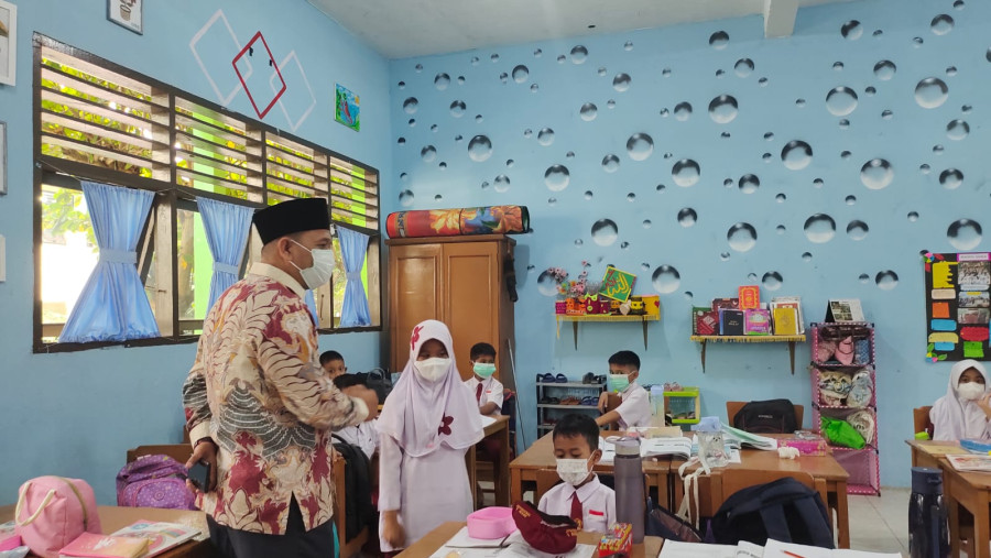 Dampak Kabut Asap, Siswa MIN 1 Pekanbaru Mulai Memakai Masker