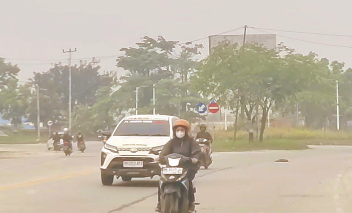 Karhutla Meluas ke Sejumlah Daerah, Asap Ganggu Akhir Pekan Warga Pekanbaru,