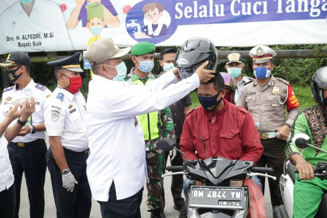 Siak Terapkan Wajib Pakai Masker Bagi Seleluruh Pendatang
