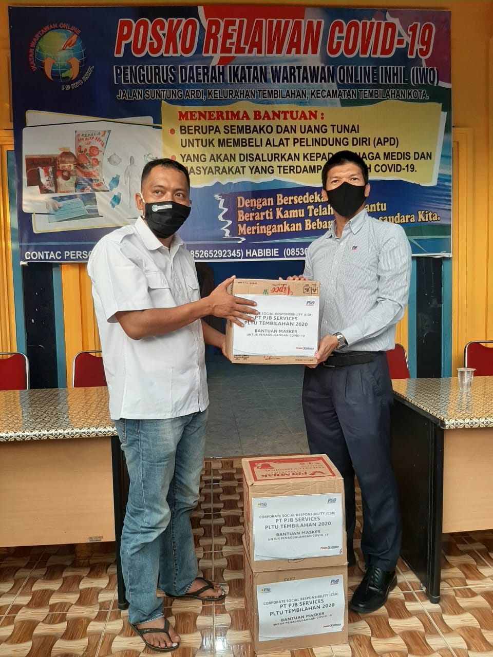 Relawan Covid-19 IWO Inhil Bagikan 500 Masker dari PLTU