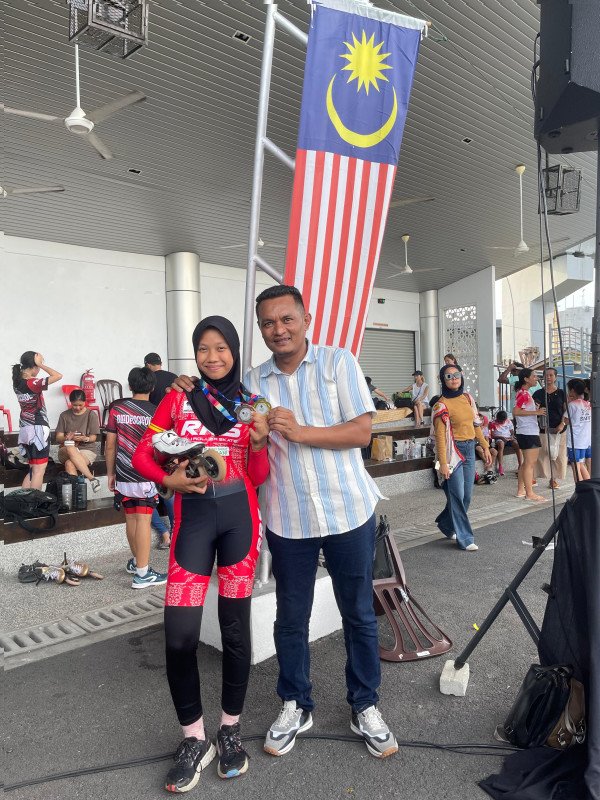 Emas dari Negeri Jiran: Atifa Harzula Kibarkan Merah Putih di Malaysia