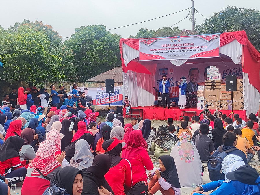 Gerak Jalan Santai, Agung Nugroho Ajak Warga Rumbai Menangkan AMAn
