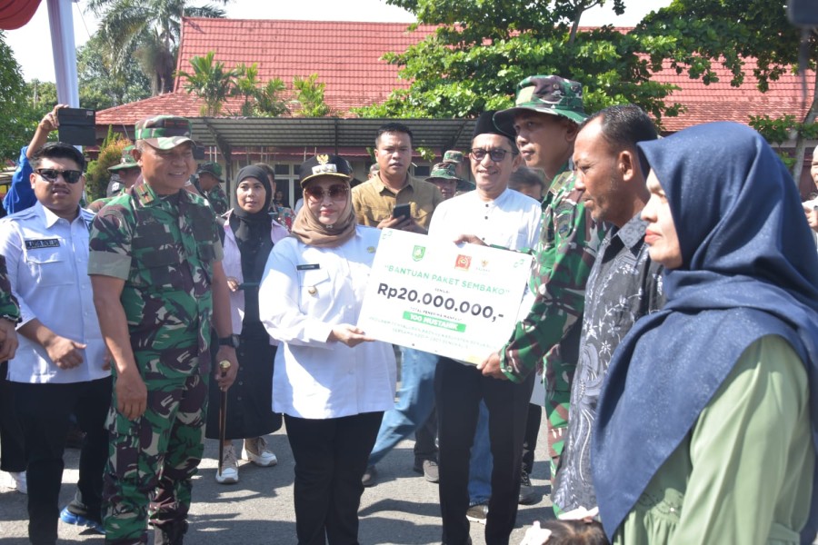 Bupati Kasmarni Hadiri Penutupan TMMD ke-124, Dorong Sinergi Bangun Desa