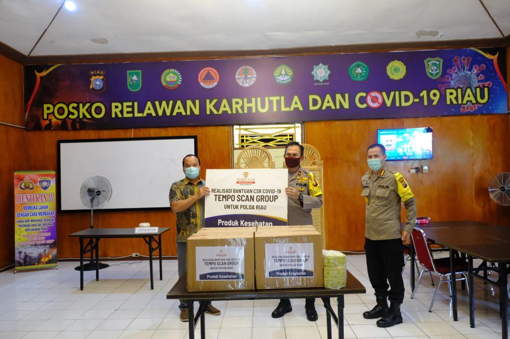 Wakapolda Serahkan Bantuan PT Tempo Scan Groups Bagi Personel Gugus Tugas Covid-19 Polda Riau