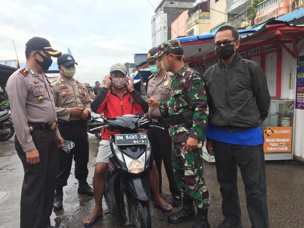 Sambu Grup Bagikan 7.000 Masker di 3 Kecamatan