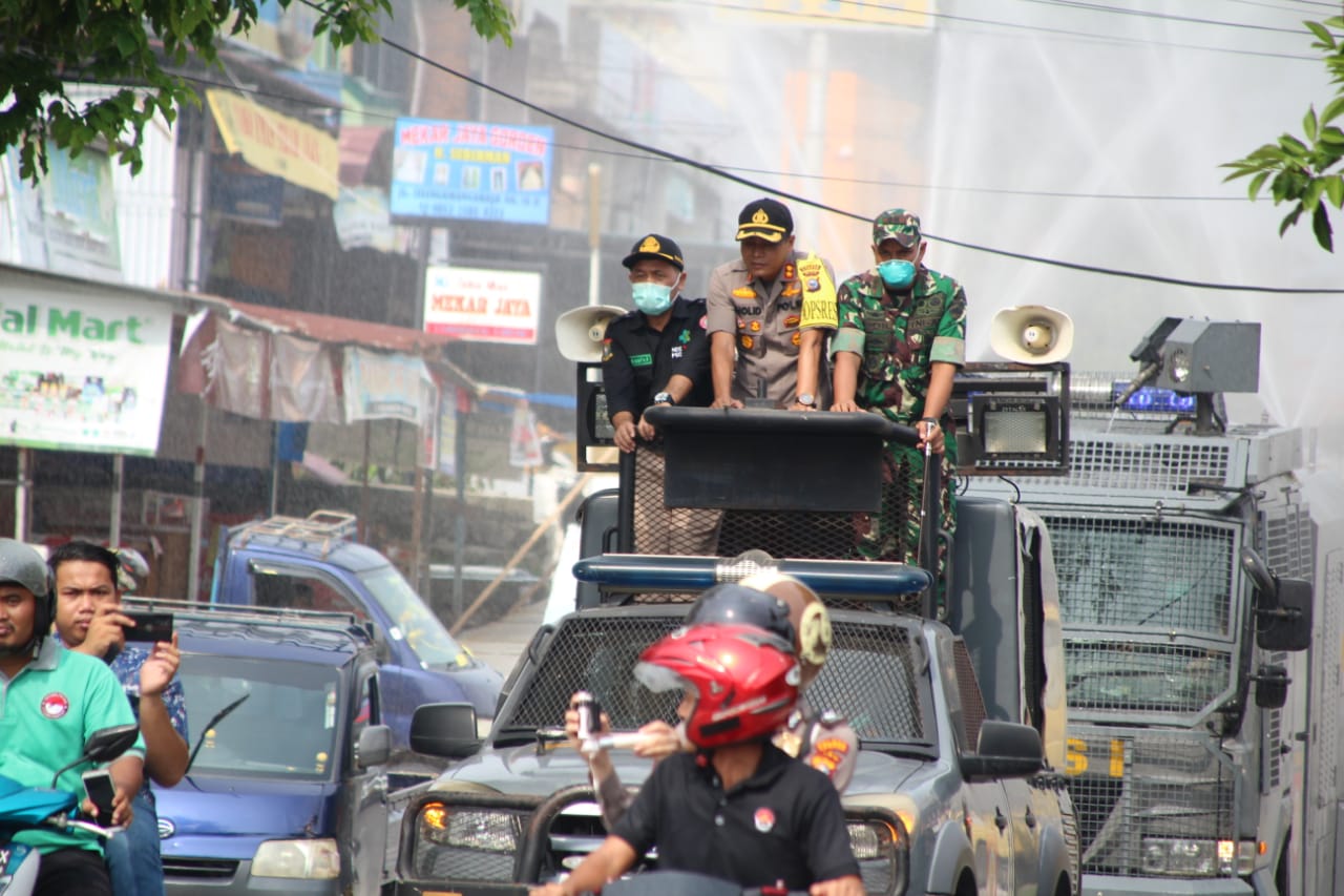 Antisipasi Penyebaran Covid-19, Polres Kampar, Kodim dan Pemkab Semprotkan Desinfektan Secara Serentak