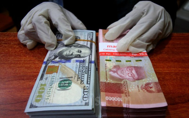 Rupiah Menguat Setelah Jokowi Tanda Tangani UU Cipta Kerja