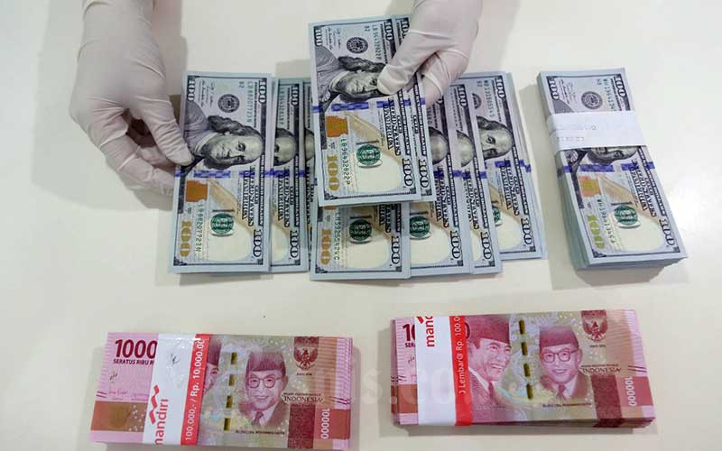 Rupiah Hari ini Melemah ke Rp14.105 per Dolar AS