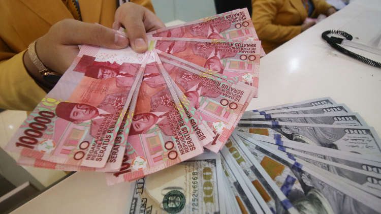 Rupiah Pagi ini Lesu ke Rp14.261 per Dolar AS  
