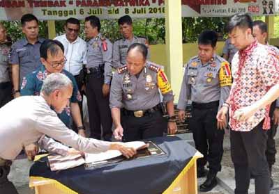 Kapolres Kuansing Tandatangani Hibah Pembangunan Pagar dan Pos Penjagaan Melalui Program CSR PT RAPP