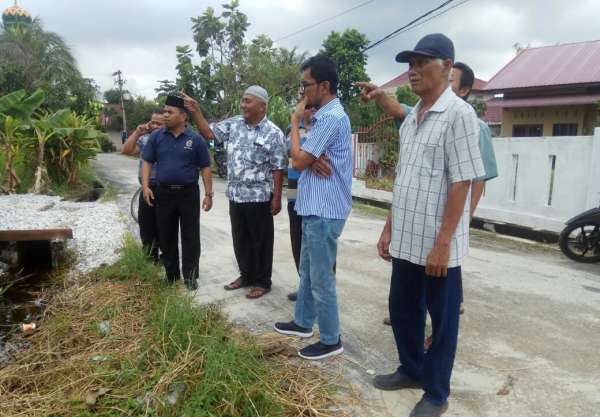Atasi Banjir, Lurah Tangkerang Barat Mediasi Lapangan